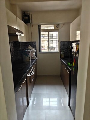 Kitchen in 1 BHK Apartment at Lodha Amara Tower 6 and 22, Kolsewadi – for Sale