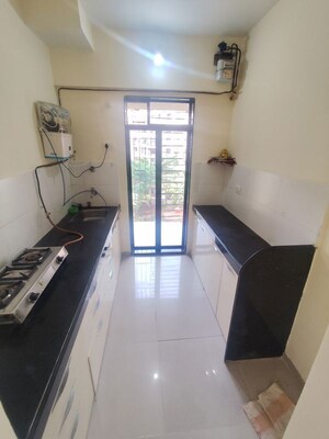 Kitchen in 2 BHK Apartment at Squarefeet Grand Square, Anand Nagar – for Sale