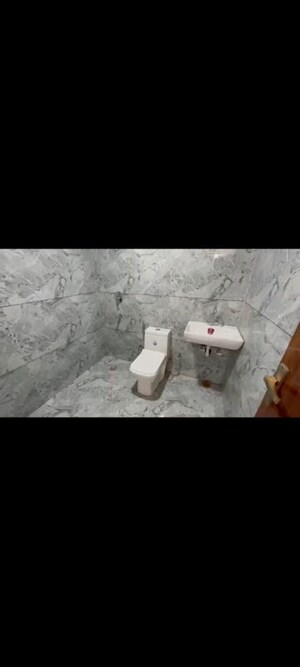 Bathroom in 4 BHK Builder Floor at Mahavir Enclave – for Sale