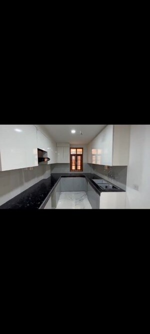 Kitchen in 4 BHK Builder Floor at Mahavir Enclave – for Sale