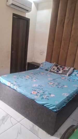 Bedroom in 3 BHK Builder Floor at Lake View Complex, Dhakoli – for Rent
