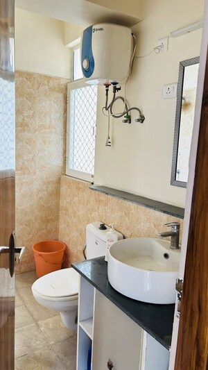 Bathroom in 3 BHK Apartment at Jaypee Kensington Park Apartments, Sector 133 – for Rent