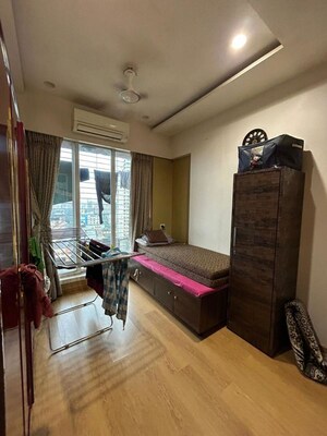 Living Room in 4 BHK Apartment at Eskay Itus Apartment, Andheri West – for Rent