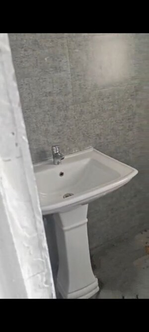 Bathroom in 3 BHK Apartment at Migsun Atharva, Raj Nagar Extension – for Rent