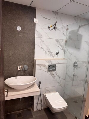 Bathroom in 3 BHK Builder Floor at Prem Satyam Swastik Apartment, Patiala Road – for Rent