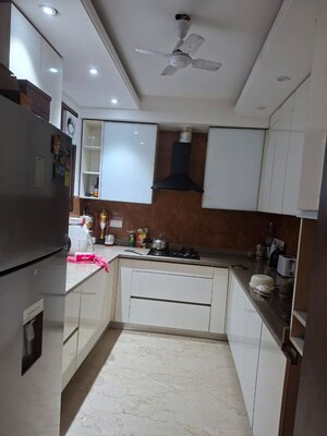 Kitchen in 3 BHK Builder Floor at Shivalik Colony – for Sale