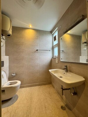 Bathroom in 3 BHK Builder Floor at Defence Colony – for Rent