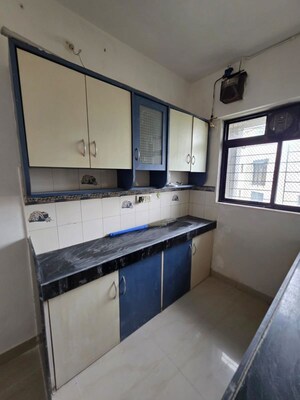 Kitchen in 2 BHK Apartment at Aastha Heights, Goregaon West – for Sale
