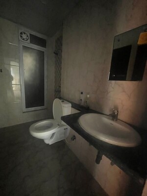 Bathroom in 2.5 BHK Apartment at Mahagun Mirabella, Sector 79 – for Sale