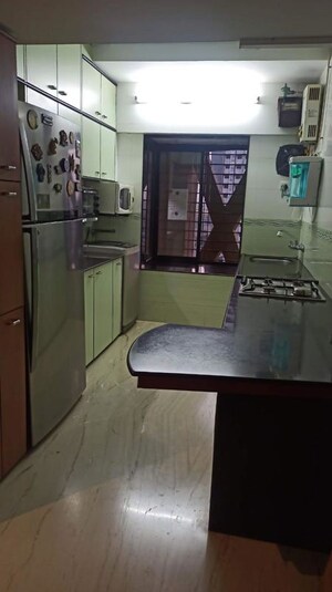 Team Area in 2 BHK Apartment at Acme Avenue, Kandivali West – for Sale