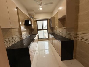 Kitchen in 4 BHK Apartment at Raj Infinia, Malad West – for Sale