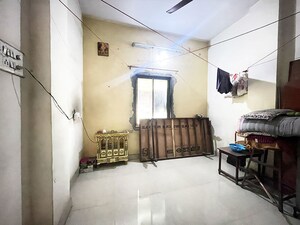 Living Room in 2 BHK Apartment at Maninagar East – for Sale