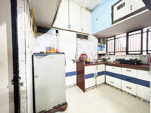 Kitchen in 2 BHK Apartment at Maninagar East – for Sale