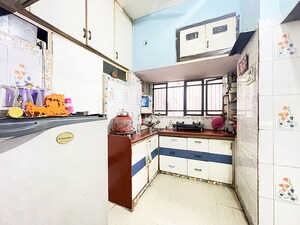 Kitchen in 2 BHK Apartment at Maninagar East – for Sale