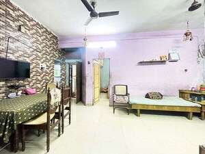Living Room in 2 BHK Apartment at Maninagar East – for Sale
