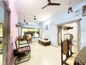 Living Room in 2 BHK Apartment at Maninagar East – for Sale
