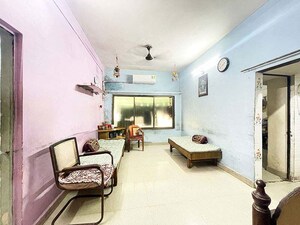 Living Room in 2 BHK Apartment at Maninagar East – for Sale