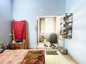 Living Room in 2 BHK Apartment at Maninagar East – for Sale