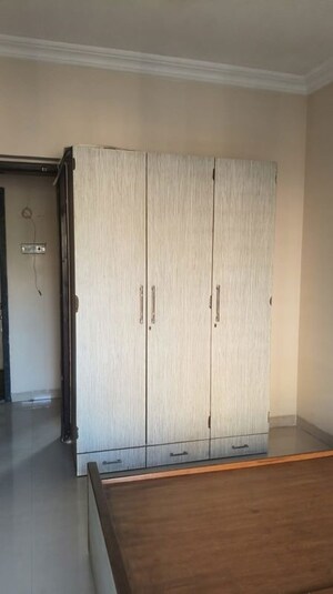 Bedroom in 2 BHK Apartment at K Raheja Heights, Malad East – for Rent