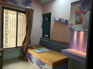 Living Room in 1.5 BHK Apartment at Madhav Palacia, Ghodbunder Road – for Sale