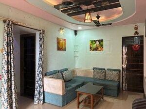 Living Room in 1.5 BHK Apartment at Madhav Palacia, Ghodbunder Road – for Sale