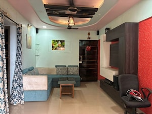 Living Room in 1.5 BHK Apartment at Madhav Palacia, Ghodbunder Road – for Sale