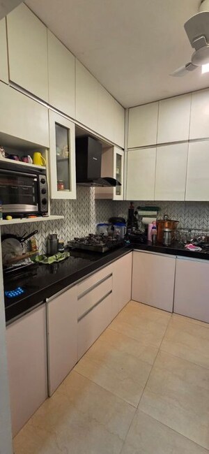Kitchen in 2 BHK Apartment at Mahindra Vicino, Andheri East – for Rent