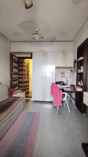 Living Room in 1 BHK Apartment at Pagoda View, Kandivali West – for Rent