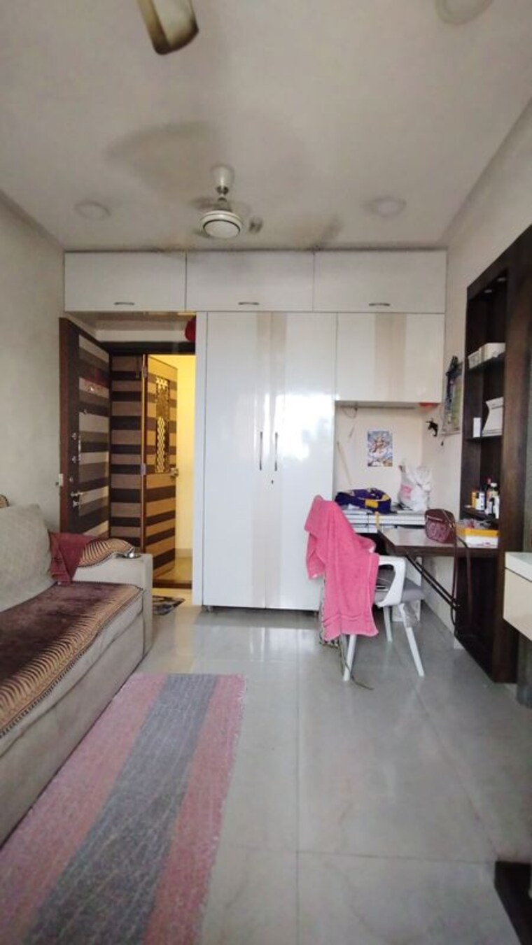 Living Room, pagoda-view 1 Bedroom 400 Sq.Ft. Apartment In Kandivali West Mumbai 10625072