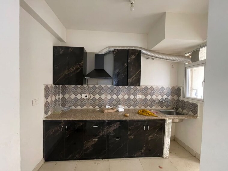 Kitchen, signature-global-proxima-phase-2 2 Bedroom 588 Sq.Ft. Apartment In Sector 89 Gurgaon 10625108