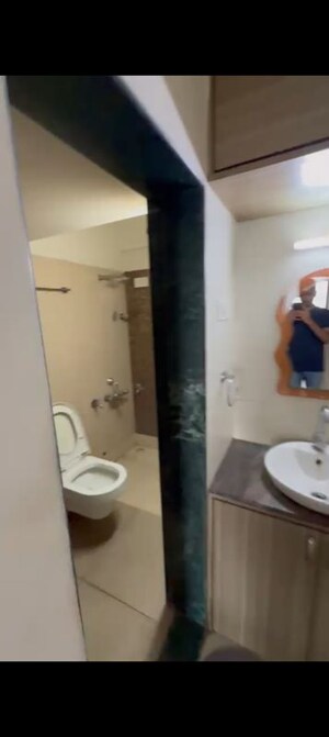 Bathroom in 2 BHK Apartment at Puranik City, Kasarvadavali – for Rent