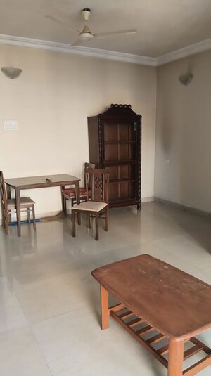 Living Room in 1 BHK Apartment at K Raheja Heights, Malad East – for Rent