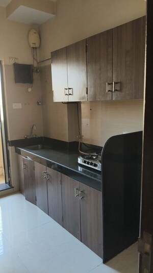 Kitchen in 1 BHK Apartment at K Raheja Heights, Malad East – for Rent