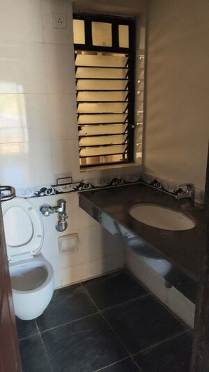 Bathroom in 1 BHK Apartment at K Raheja Heights, Malad East – for Rent