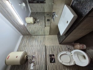 Bathroom in 3 BHK Builder Floor at Sushant Lok I – for Rent