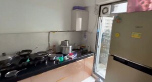 Kitchen in 2 BHK Apartment at Ashar Metro Towers, Vartak Nagar – for Rent
