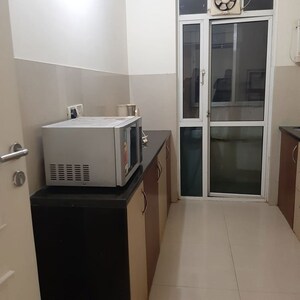 Kitchen in 1 BHK Apartment at Dhamji Shamji Mahavir Spring Tulip Phase 1, Pokhran Road No Two – for Rent