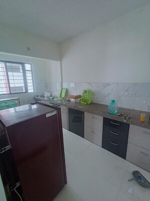 Kitchen in 2.5 BHK Apartment at Godrej Park Greens, Mamurdi – for Rent