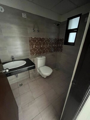Bathroom in 2 BHK Apartment at Conscient Habitat 102, Sector 102 – for Rent