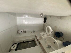 Bathroom in 2 BHK Apartment at Runwal Gardens, Dombivli East – for Rent