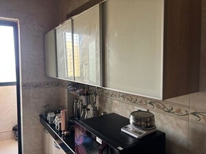 Kitchen in 2 BHK Apartment at K Raheja Heights, Malad East – for Sale