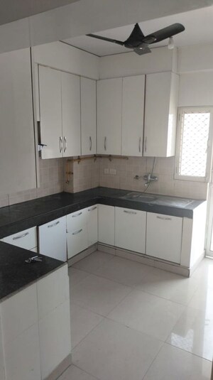 Kitchen in 3 BHK Apartment at SVP Gulmohur Garden, Raj Nagar Extension – for Rent