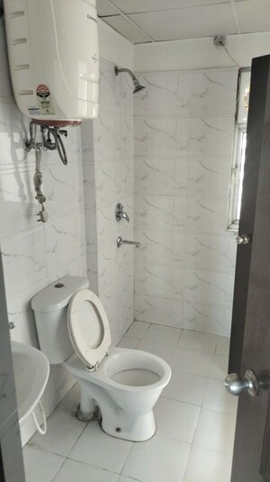 Bathroom in 3 BHK Apartment at SVP Gulmohur Garden, Raj Nagar Extension – for Rent
