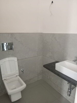 Bathroom in  Showroom at Mansarover Garden – for Rent