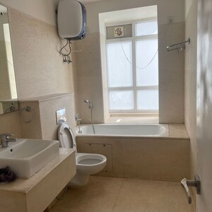 Bathroom in 3.5 BHK Apartment at Emaar MGF The Palm Drive Villas, Sector 66 – for Rent