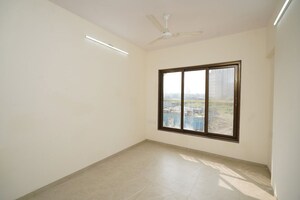 Room in 2 BHK Apartment at Abrol Signature, Malad West – for Sale