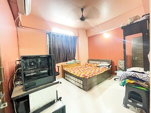 Living Room in 2 BHK Apartment at Narol – for Sale