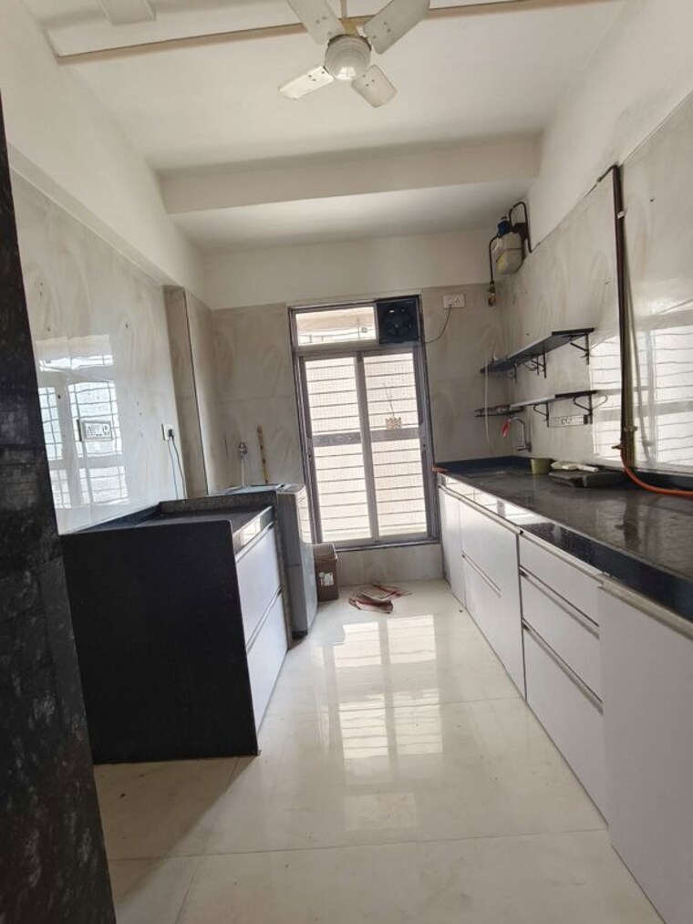 Kitchen, jay-amrat-apartment 2.5 Bedroom 700 Sq.Ft. Apartment In Malad West Mumbai 10625526