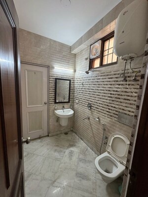 Bathroom in 3 BHK Apartment at Khirki Extension – for Rent