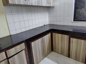 Kitchen in 2 BHK Apartment at Basera Apartment, Salunkhe Vihar Society – for Rent
